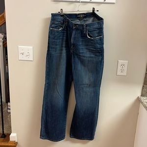 Jeans with distressed hems